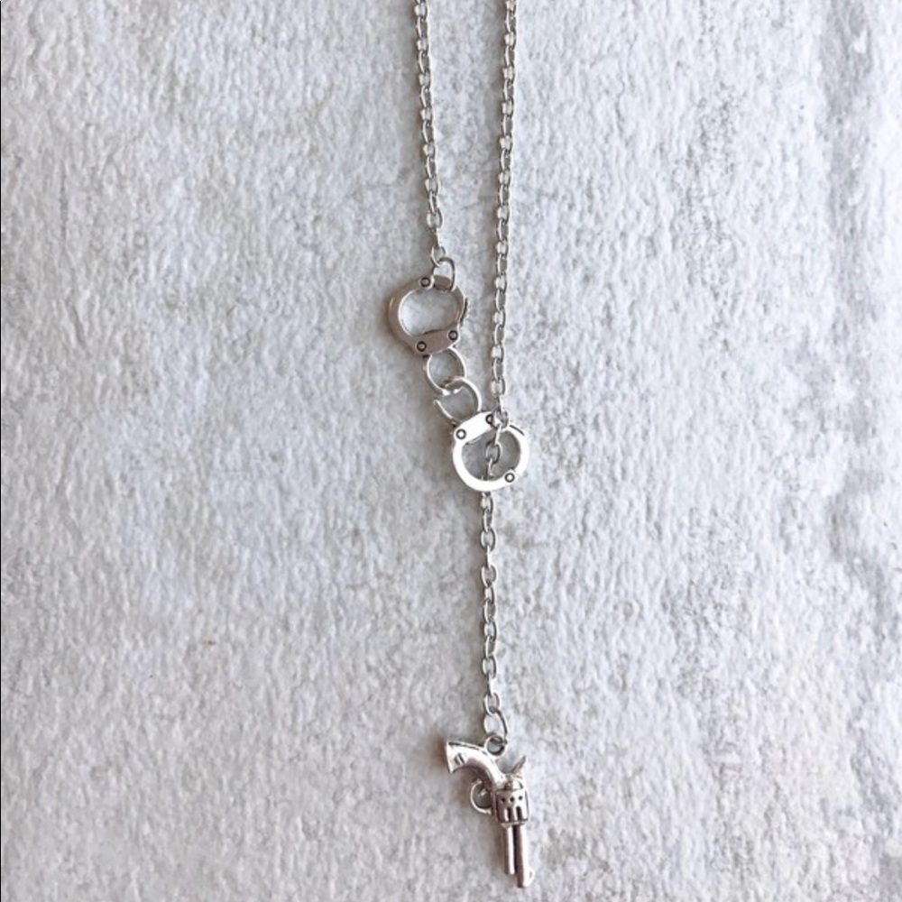 Gun and handcuffs necklace